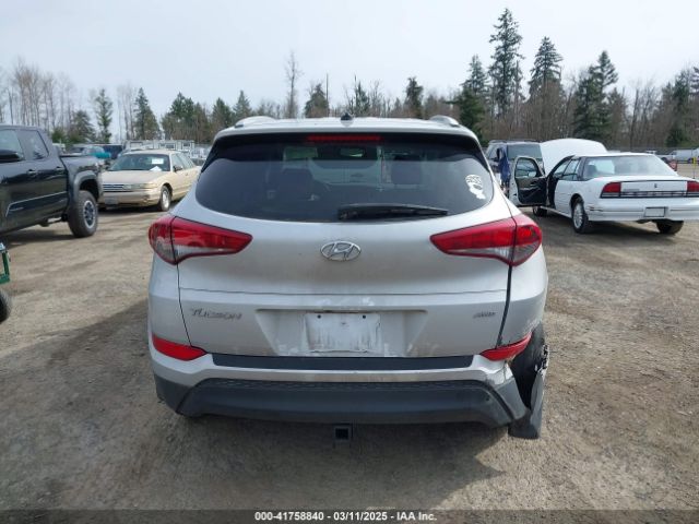 KM8J3CA40GU257379 Hyundai TUCSON SE