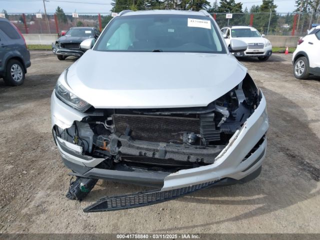 KM8J3CA40GU257379 Hyundai TUCSON SE