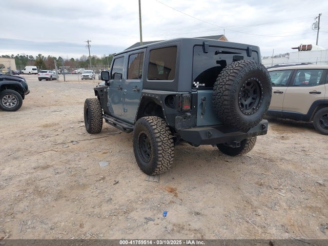 1C4BJWDG9EL104220 Jeep Wrangler Unlimited Sport