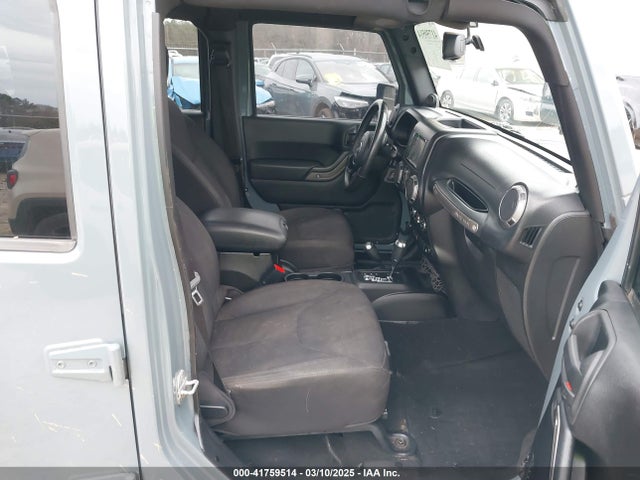 1C4BJWDG9EL104220 Jeep Wrangler Unlimited Sport
