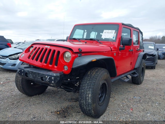 1C4BJWDGXFL610818 Jeep Wrangler Unlimited Sport