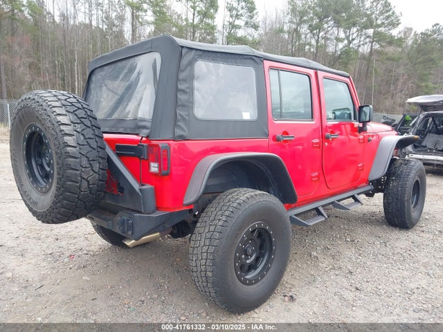 1C4BJWDGXFL610818 Jeep Wrangler Unlimited Sport