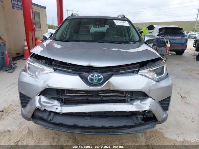 JTMRJREV7JD183808 Toyota Rav4 Hybrid Le