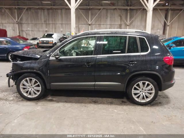 WVGAV3AX4EW528594 Volkswagen TIGUAN SE