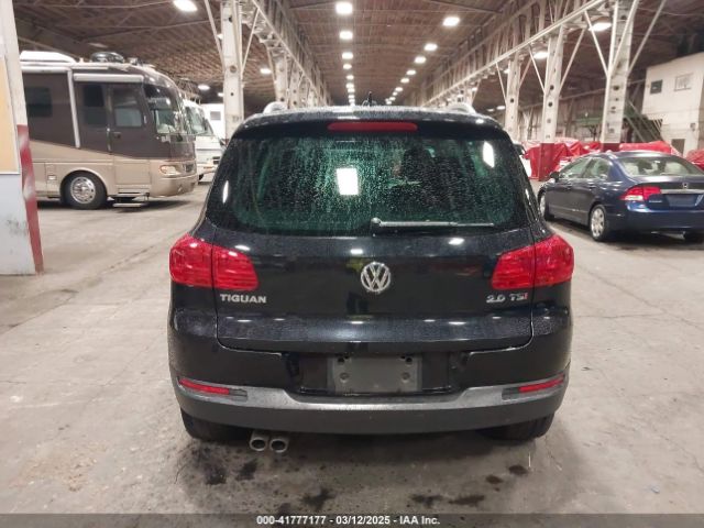 WVGAV3AX4EW528594 Volkswagen TIGUAN SE