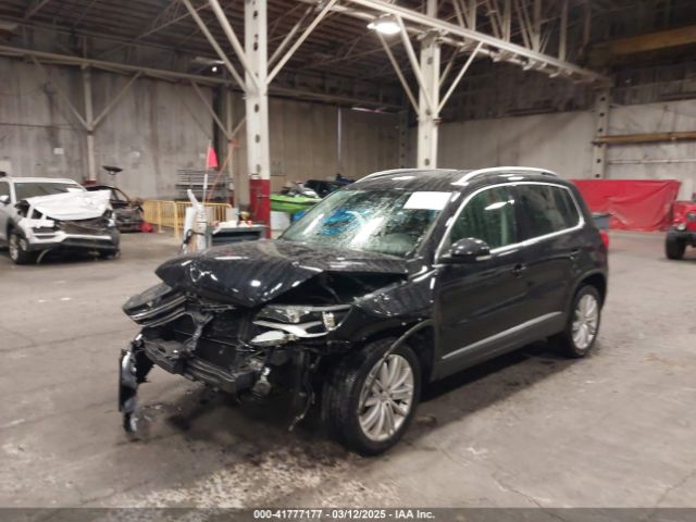 WVGAV3AX4EW528594 Volkswagen TIGUAN SE