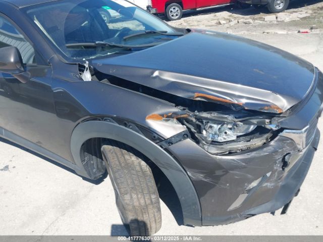 JM1DKBC7XG0114940 Mazda Cx-3 Touring