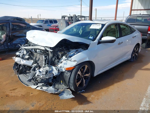 JHMFC1F92JX035742 Honda Civic Touring