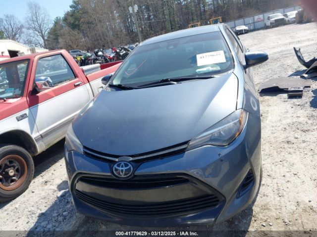 2T1BURHE4KC134729 Toyota COROLLA LE