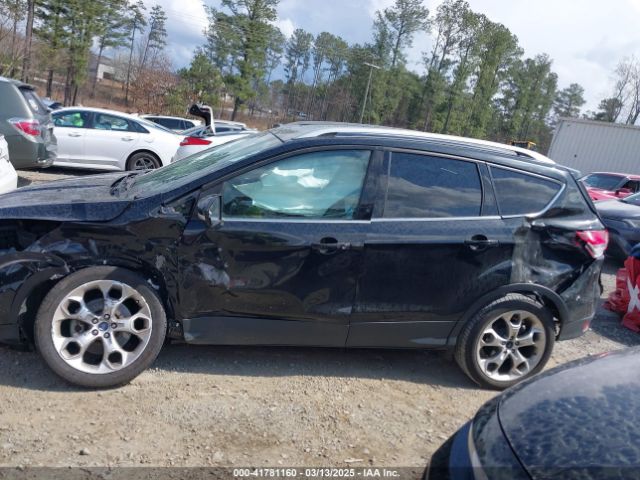 1FMCU0J91EUD62946 Ford Escape Titanium