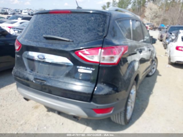 1FMCU0J91EUD62946 Ford Escape Titanium