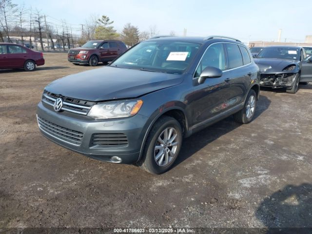 2014 VOLKSWAGEN TOUAREG WVGEF9BP9ED010718 Photo 1