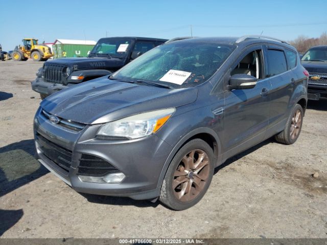 1FMCU0J9XEUD56014 Ford Escape Titanium