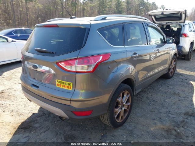 1FMCU0J9XEUD56014 Ford Escape Titanium