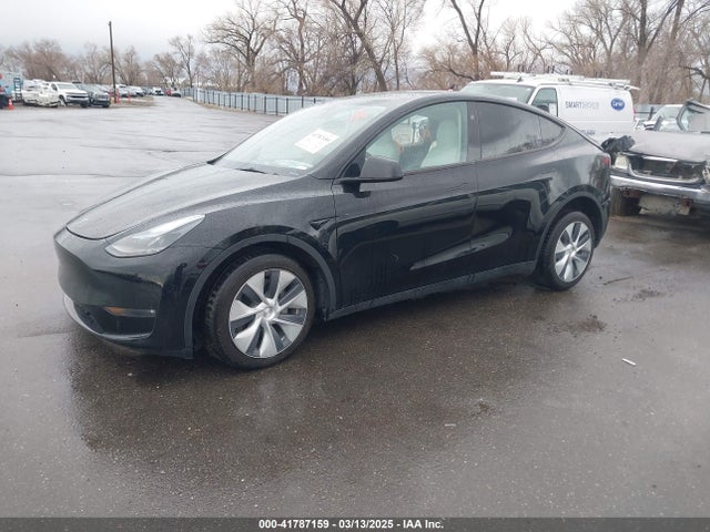 2023 TESLA MODEL Y 7SAYGDEE8PF919284 Photo 1