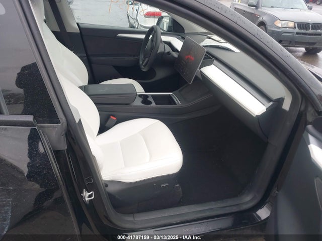 2023 TESLA MODEL Y 7SAYGDEE8PF919284 Photo 4