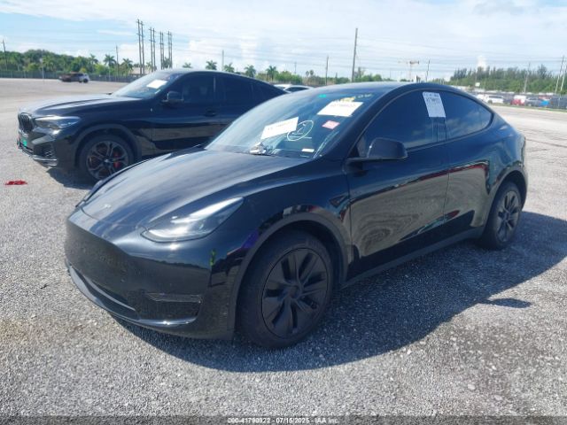 2024 TESLA MODEL Y 7SAYGDED6RF191135 Photo 1