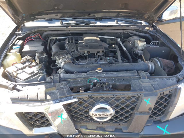 1N6AD0CW5EN751028 Nissan Frontier Sv