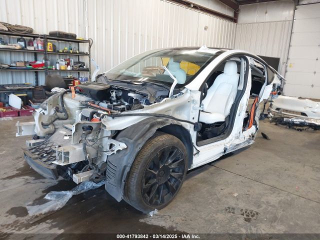 2021 TESLA MODEL Y 5YJYGAEE1MF216200 Photo 1