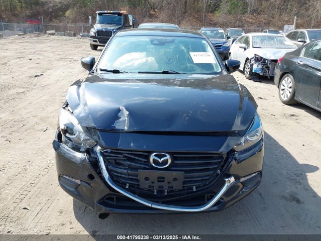 3MZBN1V34JM261565 Mazda Mazda3 Touring