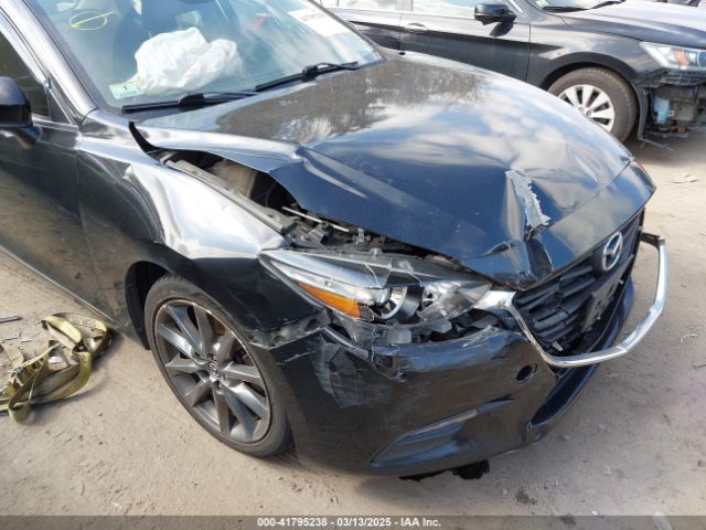 3MZBN1V34JM261565 Mazda Mazda3 Touring