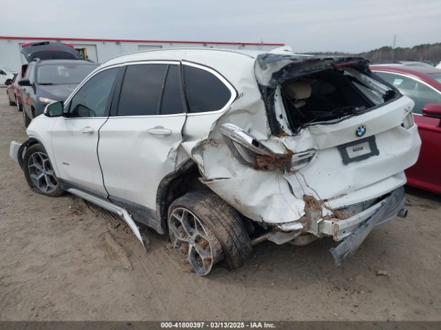 2018 BMW X1 WBXHT3C31J5K22765 Photo 2
