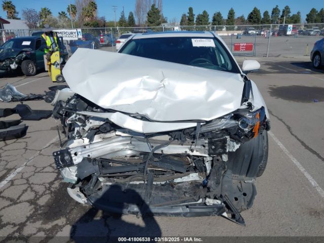 4T1F31AK7MU548885 Toyota Camry Xle Hybrid