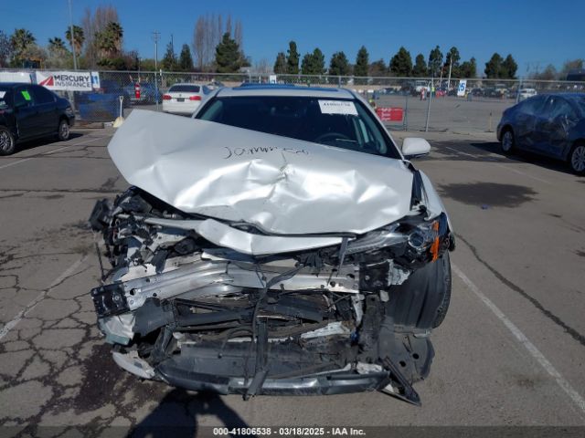 4T1F31AK7MU548885 Toyota Camry Xle Hybrid