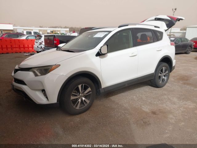 JTMWFREV2JJ730568 Toyota Rav4 Xle
