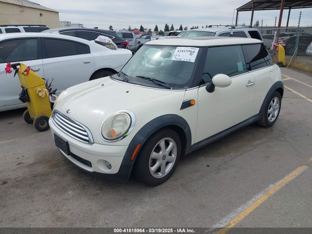2010 MINI COOPER WMWMF3C59ATZ24989 Photo 1
