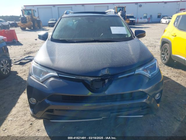JTMWFREV9JJ200629 Toyota Rav4 Xle