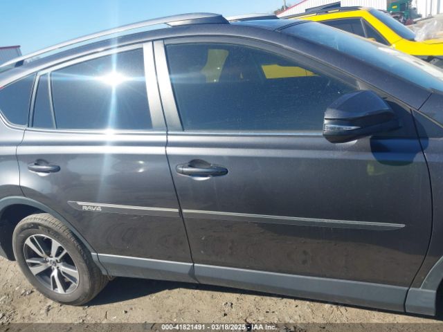 JTMWFREV9JJ200629 Toyota Rav4 Xle
