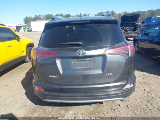 JTMWFREV9JJ200629 Toyota Rav4 Xle
