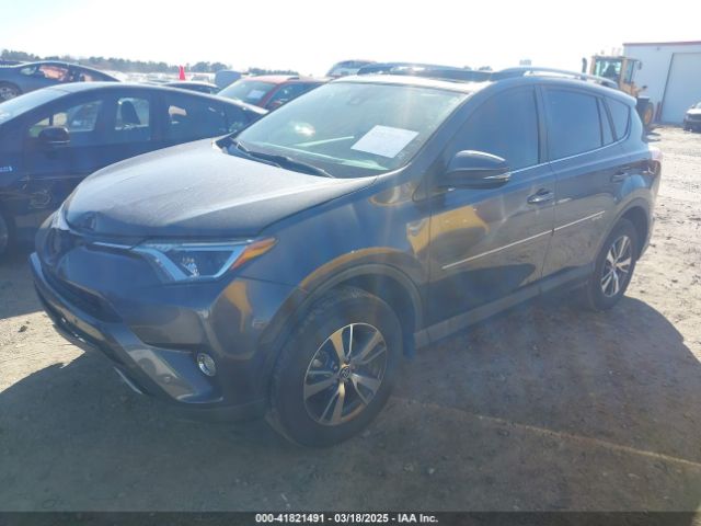 JTMWFREV9JJ200629 Toyota Rav4 Xle