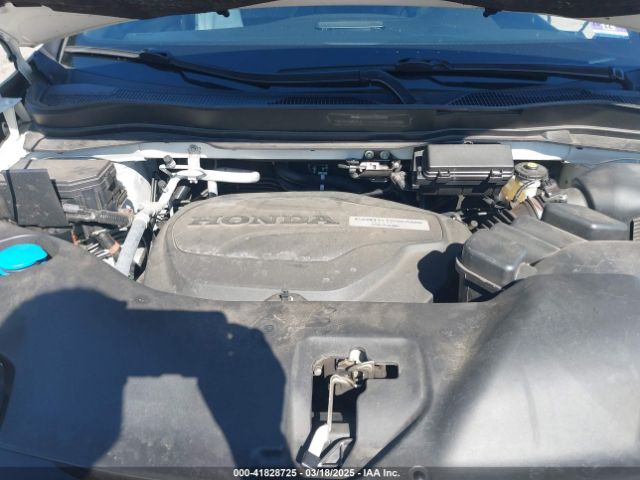 5FNYF8H04KB005307 Honda Passport Elite