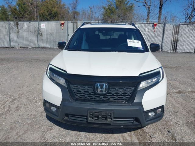 5FNYF8H04KB005307 Honda Passport Elite