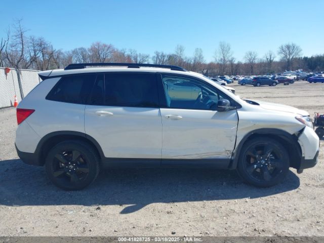 5FNYF8H04KB005307 Honda Passport Elite