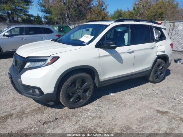 5FNYF8H04KB005307 Honda Passport Elite