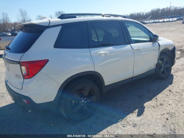 5FNYF8H04KB005307 Honda Passport Elite
