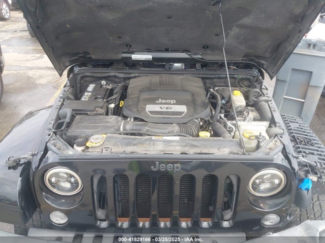 1C4BJWEG4FL542689 Jeep Wrangler Unlimited Sahara
