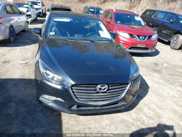 3MZBN1V34JM208669 Mazda Mazda3 Touring