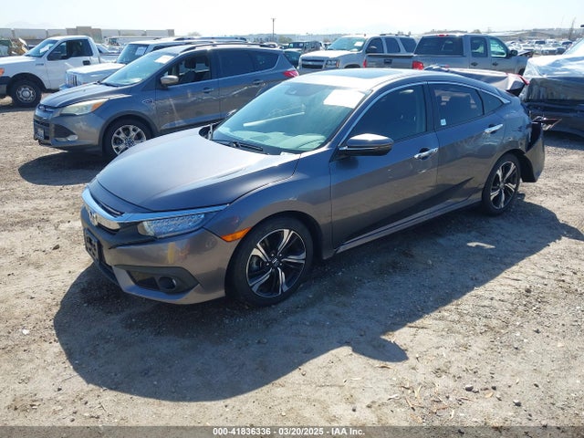JHMFC1F93JX013362 Honda Civic Touring