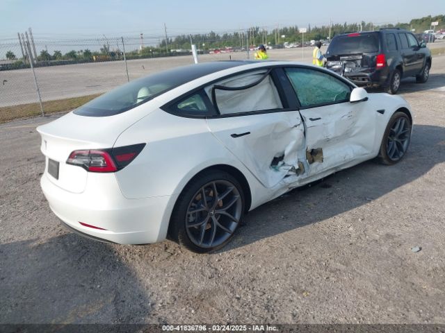 5YJ3E1EAXMF908601 Tesla Model 3 Standard Range Plus Rear-wheel Drive