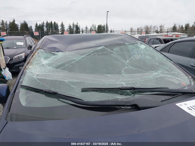 JTDKN3DU8E0371584 Toyota Prius Three