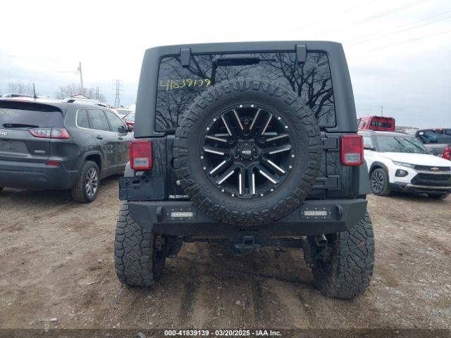 1C4BJWDG0GL340824 Jeep Wrangler Unlimited Sport