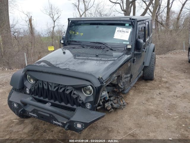 1C4BJWDG0GL340824 Jeep Wrangler Unlimited Sport