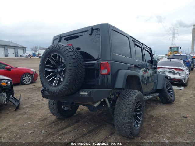 1C4BJWDG0GL340824 Jeep Wrangler Unlimited Sport