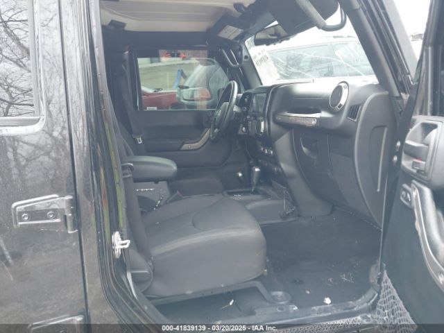 1C4BJWDG0GL340824 Jeep Wrangler Unlimited Sport