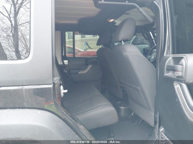 1C4BJWDG0GL340824 Jeep Wrangler Unlimited Sport