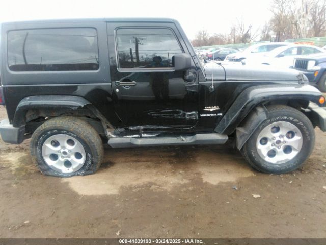 1C4AJWBG9EL161712 Jeep Wrangler Sahara